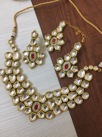 Beautiful Golden and White Color Kundan Necklace with Back Meenakari and Red Pearls added
