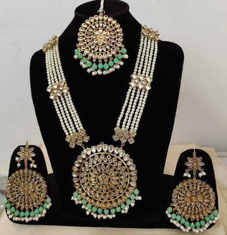 Classy Kundan Rani Haar with Beautiful Big Size Earrings and Tika Set along with Extra Green Color Beads