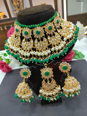 Beautiful Golden and White Color Necklace, Earrings and Maang Tikka along with Extra Green Color Beads