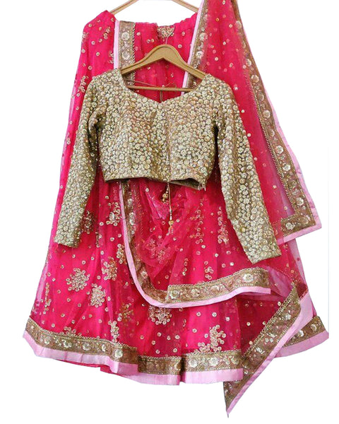 Fantastic Pink Colored Partywear Embroidered Net Lehenga Choli