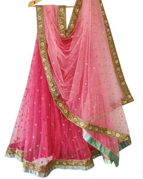 Pink Colored Partywear Embroidered Net Lehenga Choli