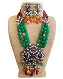Party Wear Kundan Silver Tone Green And Red Pearl Beaded Necklace with Earrings