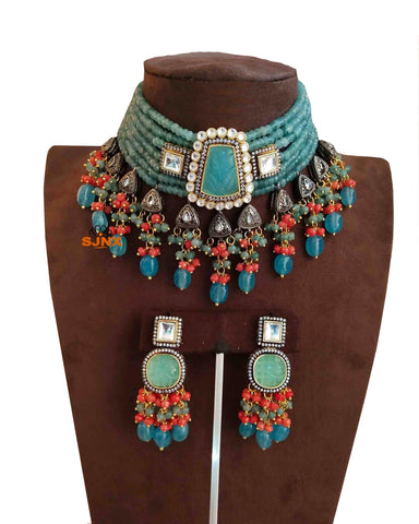 Party Wear Kundan Silver Tone Sky And Orange Pearl Beaded Necklace with Earrings