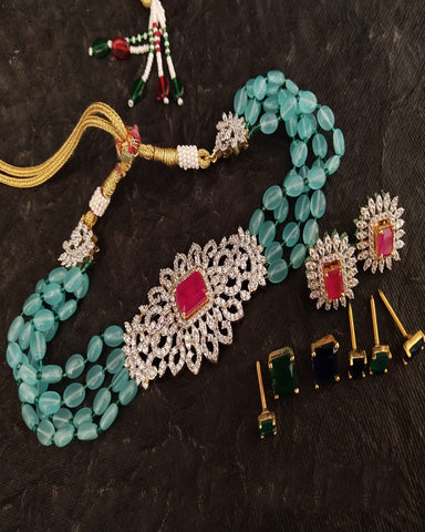 Party Wear Kundan Silver And Green Necklace with Earrings