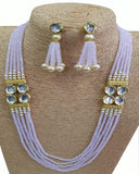 White Stone set with Golden Pearls of Earings
