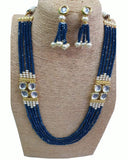 Blue Stone set with Golden Pearls of Earings