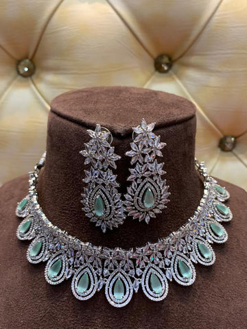 Beautiful White Color Necklace Set with Light Green Pearls