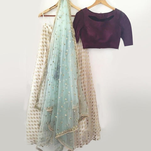 Wine-Off-White Partywear Jacquard Silk Lehenga Choli