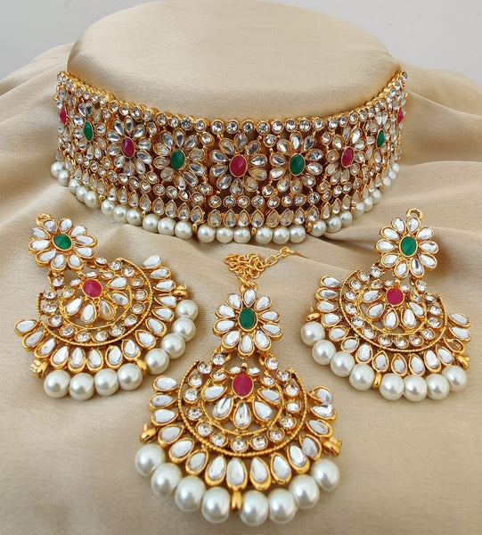 Beautiful Multi Color Necklace with Earrings and Matha Tikka designed with Attractive Pearls for Special Occasion