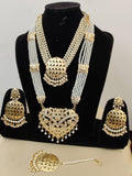 Pretty Golden Color Pearl Jadau Choker Necklace with Rani Haar and Charming Earrings Tika Set