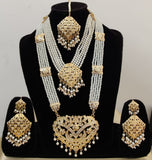 Dazzling Golden Color Pearl Jadau Choker Necklace with Rani Haar and Charming Earrings Tika Set