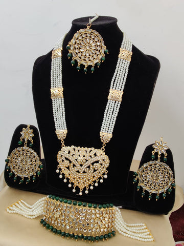 Gorgeous Golden Color Choker Necklace Set with Beautiful Jhumka and Matha Tikka and Extra Green Color Pearls