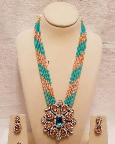Beautiful Sea Green and Dual Tone Peach Golden Color Pearls Kundan Necklace Set for Special Occasions