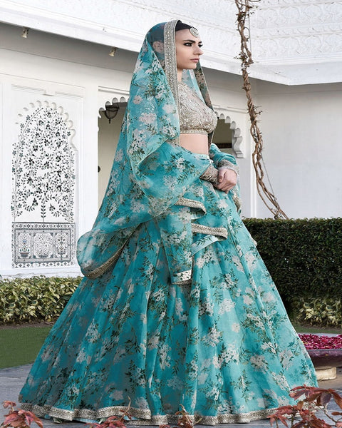 Beautiful Sabyasachi Sky Blue Color Organza Bridal Lehenga Choli with Charming Floral Design