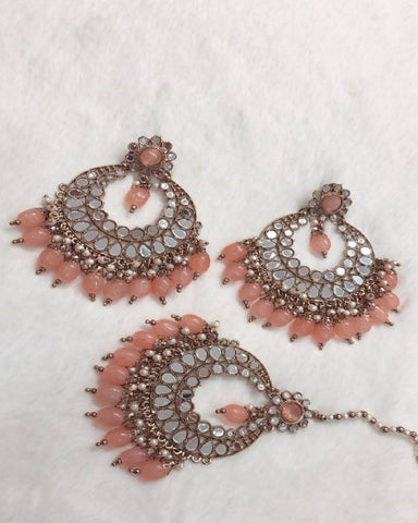 Beautiful Golden Color Earrings and Matha Tikka with Gorgeous Pink Color Pearls for Special Occasion