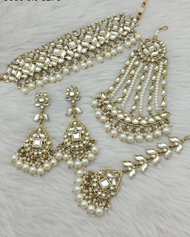 Lustrous Golden Color Necklace, Earrings, Matha Tikka and Jhoomar Set with Gorgeous White Color Pearls