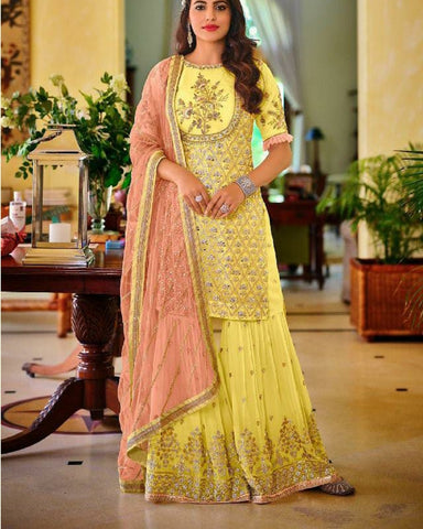 Lovely Yellow Color with Dazzling Floral Design Faux Georgette with Heavy Embroidery and Fancy Lace Work Palazzo Suit for Special Occasion
