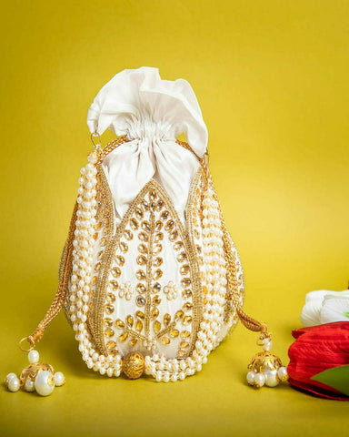 Charming White Color Kundan Lotus Shaped Potli Strictly made with Hard Base Material for Special Occasion