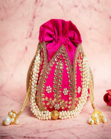 Attractive Pink Color Kundan Lotus Shaped Potli Strictly made with Hard Base Material for Special Occasion