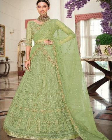 Pretty Pista Green Color Net Lehenga, Dupatta with Net Embroidered Blouse and Belt for Special Occasion