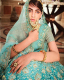 Charming Aqua Color Net Lehenga, Dupatta with Net Embroidered Blouse and Belt for Special Occasion