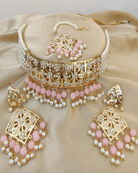 Attractive Golden Color Necklace, Earrings and Matha Tikka with Beautiful Light Pink and White Color added Pearls for Special Occasion