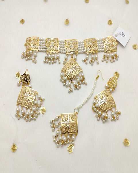 Gorgeous Golden Color Necklace, Earrings and Matha Tikka with Beautiful White Color Pearls for Special Occasion