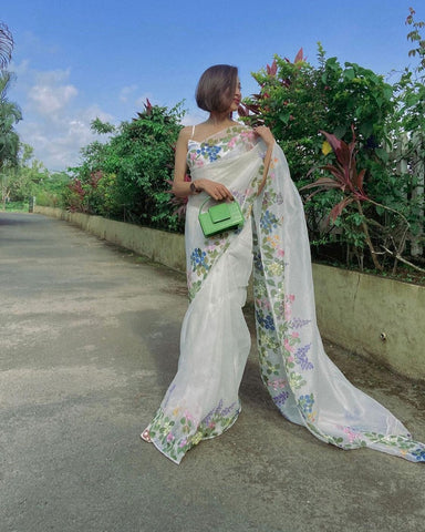 Premium Organza Silk Saree Embellished With Beautiful Print With Touch Up Of Heavy Kardana Handwork With All Over Hand Sequins and Heavy Banglori Silk Blouse