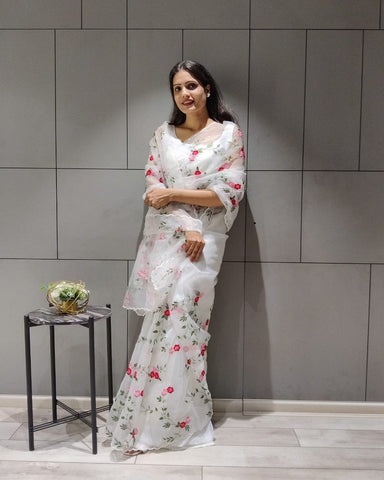 Gorgeous White Color Organza Saree Embellished With Beautiful Multi Color Embroidery Thread Work and Charming Pearl Work On Saree for Special Occasion