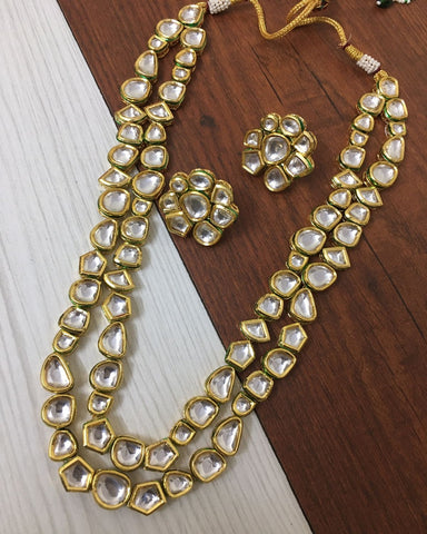 Beautiful Golden Color Kundan Necklace and Earrings with Back Meenakari for Special Occasion