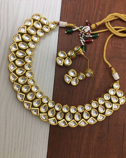 Royal Golden Color Kundan Necklace and Earrings with Lustrous White Color Pearls and Back Meenakari for Special Occasion