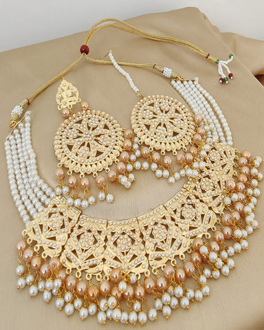 Gorgeous Golden Color Jadau Choker Necklace with Earrings and Matha Tikka for Special Occasion