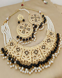 Charming Golden Color Jadau Choker Necklace with Earrings and Matha Tikka with Beautiful Black Color Pearls for Special Occasion