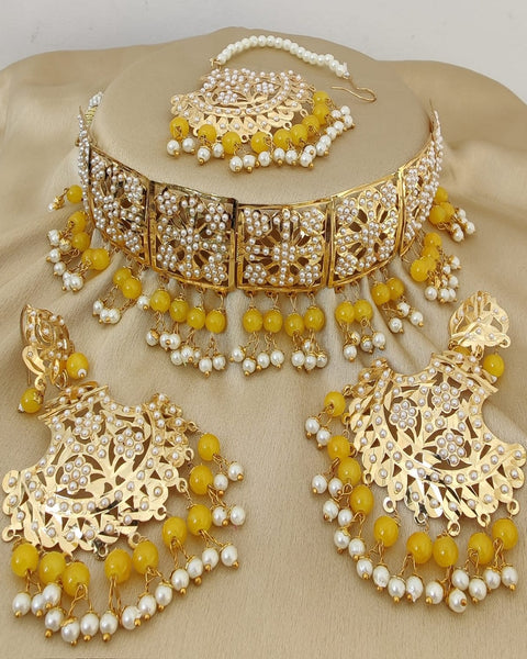 Classy Golden Color Jadau Necklace Set, Earrings and Matha Tikka with Beautiful Yellow Color Pearls for Special Occasion