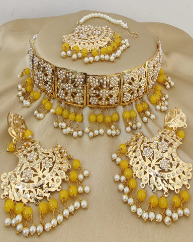 Classy Golden Color Jadau Necklace Set, Earrings and Matha Tikka with Beautiful Yellow Color Pearls for Special Occasion