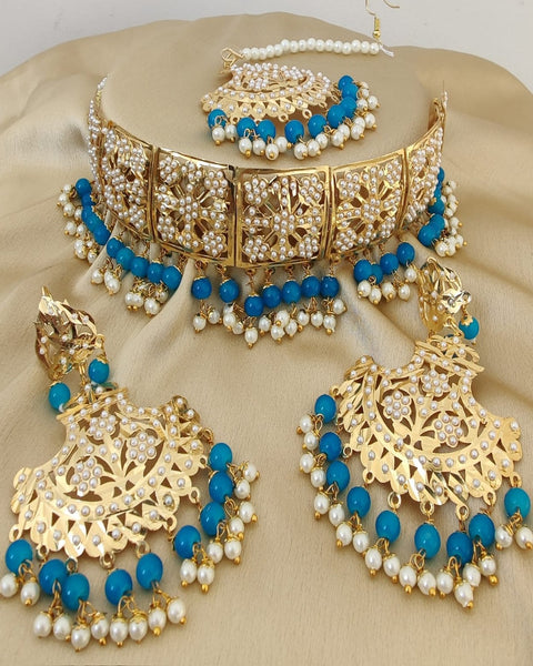 Gorgeous Golden Color Jadau Necklace Set, Earrings and Matha Tikka with Beautiful Blue Color Pearls for Special Occasion