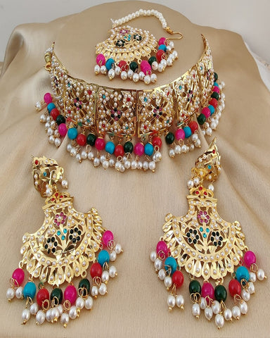 Beautiful Golden Color Jadau Necklace Set, Earrings and Matha Tikka with Multi Color Pearls for Special Occasion