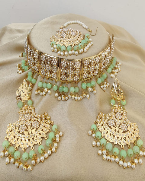 Dazzling Golden Color Jadau Necklace Set, Earrings and Matha Tikka with Beautiful Light Green Color Pearls for Special Occasion
