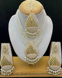 Beautiful Golden and White Color Necklace, Earrings and Matha Tikka for Special Occasion
