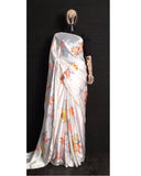 Attractive White Color Saree with Gorgeous Orange Color Floral Design and Black Color Blouse for Special Occasion