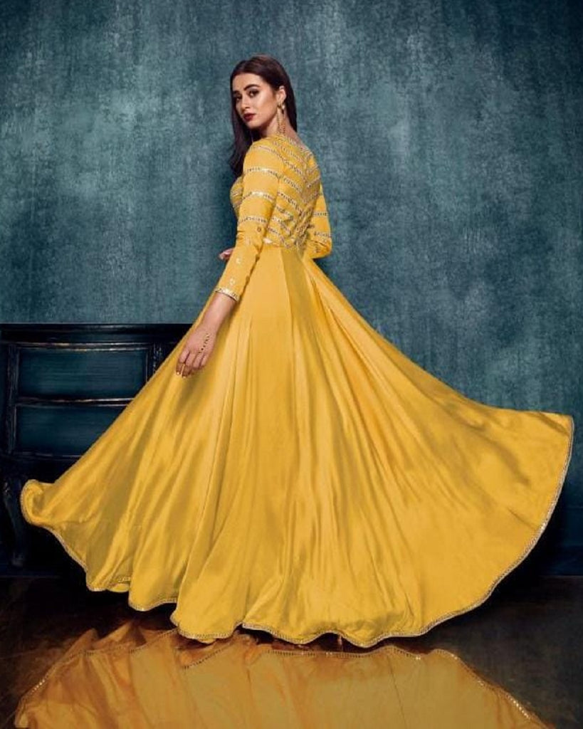 Yellow Color Satin Fabric Partywear Gown With Mirror Work