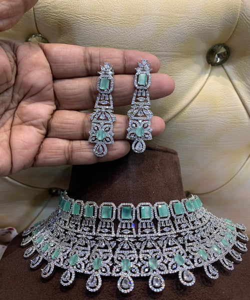Party Wear Silver and Green Jarkan Work Necklace with Earrings