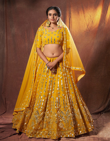 Yellow color designer mirror work lehenga choli