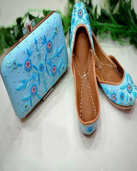 Charming Light Blue Color with Beautiful Blue and Pink Color Floral Design Handcrafted Intricately Designed Jutti and Purse Combo