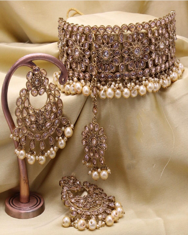 Gorgeous Golden Color Necklace, Earrings and Matha Tikka with Beautiful Brownish White Color Pearls on both Necklace and Earrings for Special Occasion