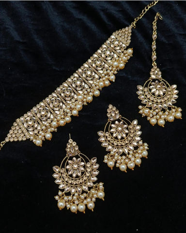 Pretty Golden Color Necklace, Earrings and Matha Tikka with Charming Pearls for Special Occasion