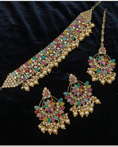 Lovely Golden Color Necklace, Earrings and Matha Tikka with Charming Multi Color Pearls for Special Occasion